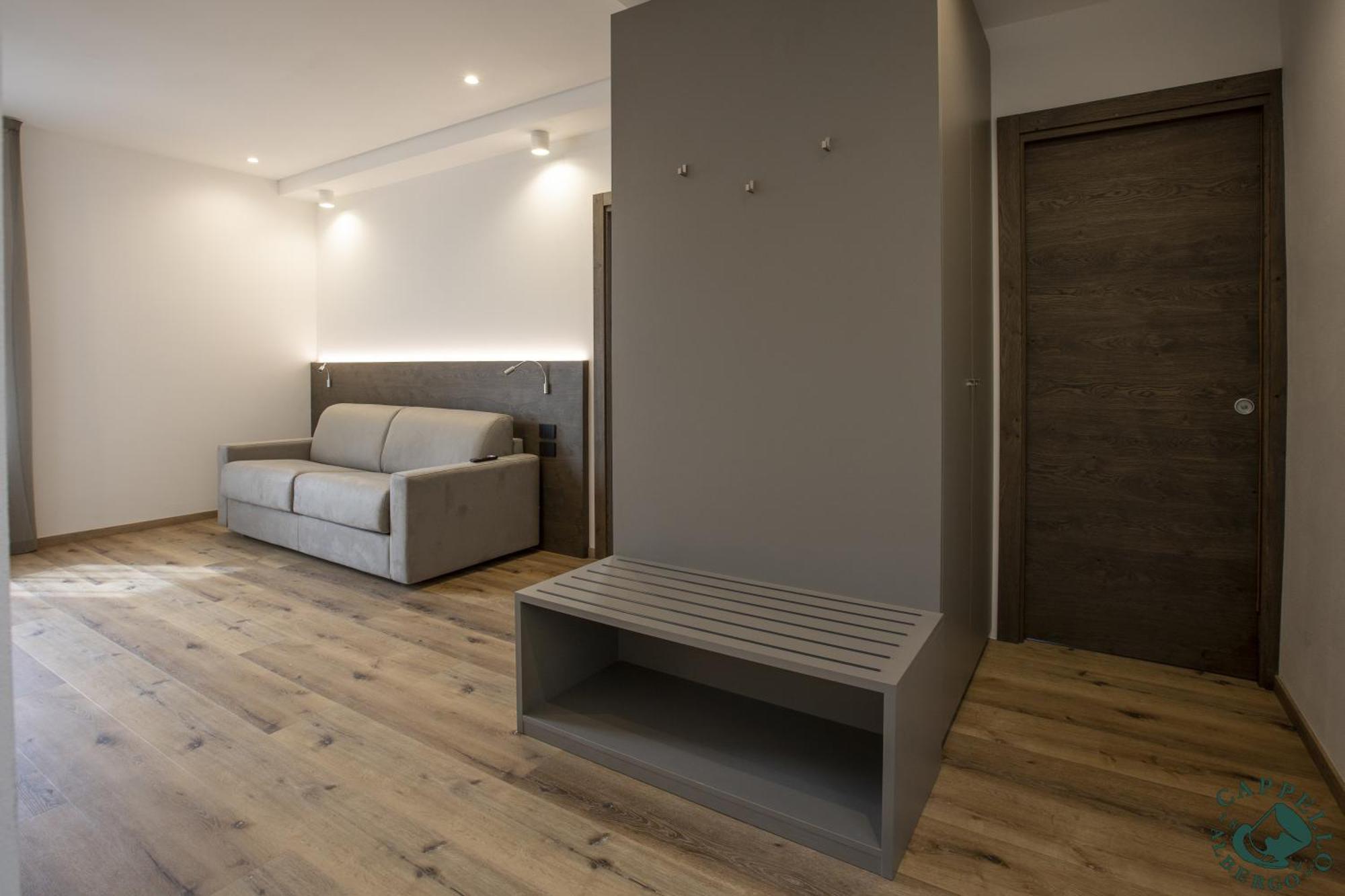 ホテル アルベルゴ カペッロ エ カドーレ ベッルーノ 部屋 写真