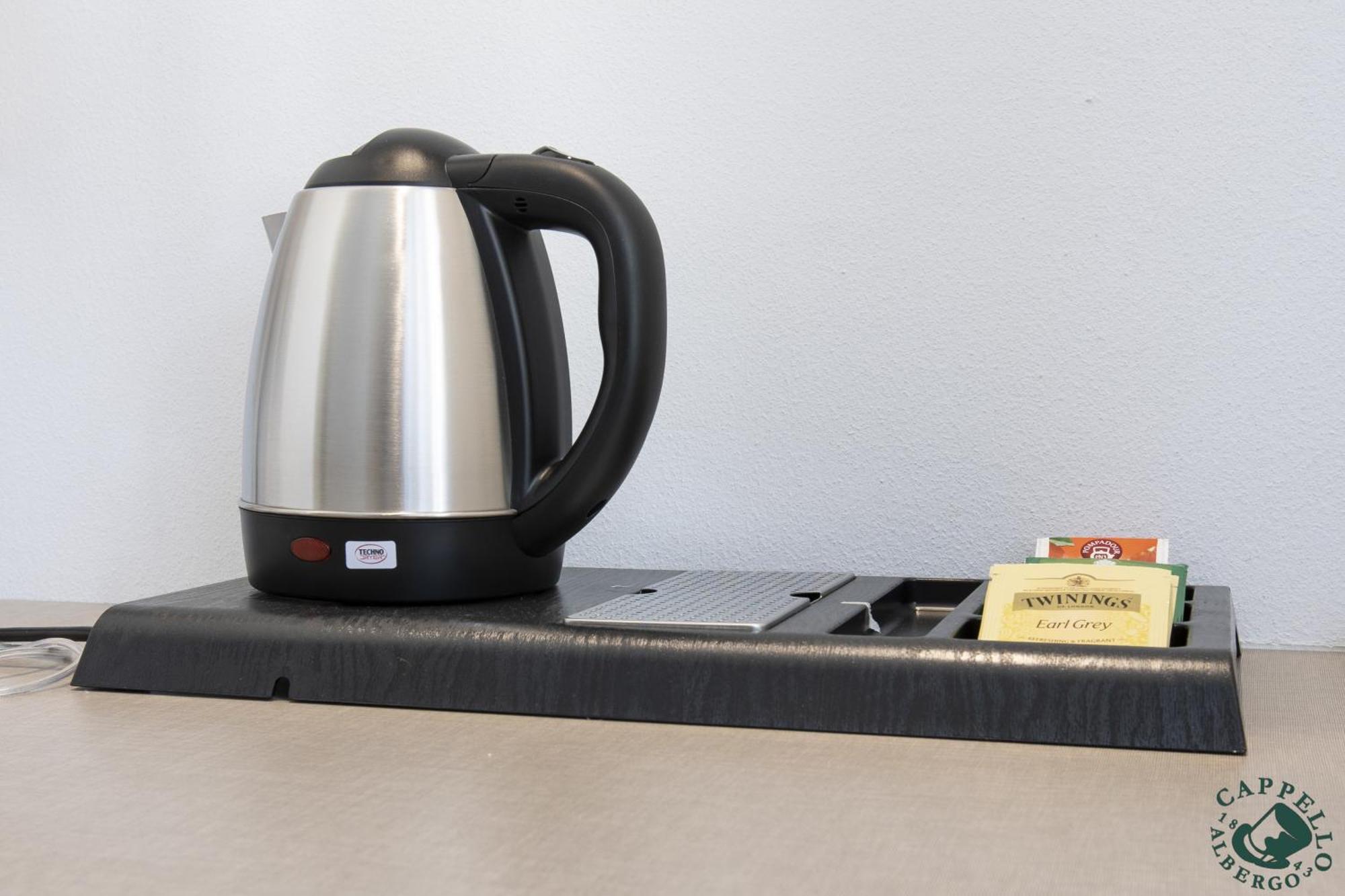 ホテル アルベルゴ カペッロ エ カドーレ ベッルーノ 部屋 写真